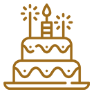 Birthday cake with candles and sparklers icon.