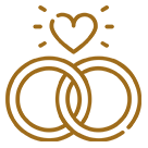 Interlocking rings with heart above.